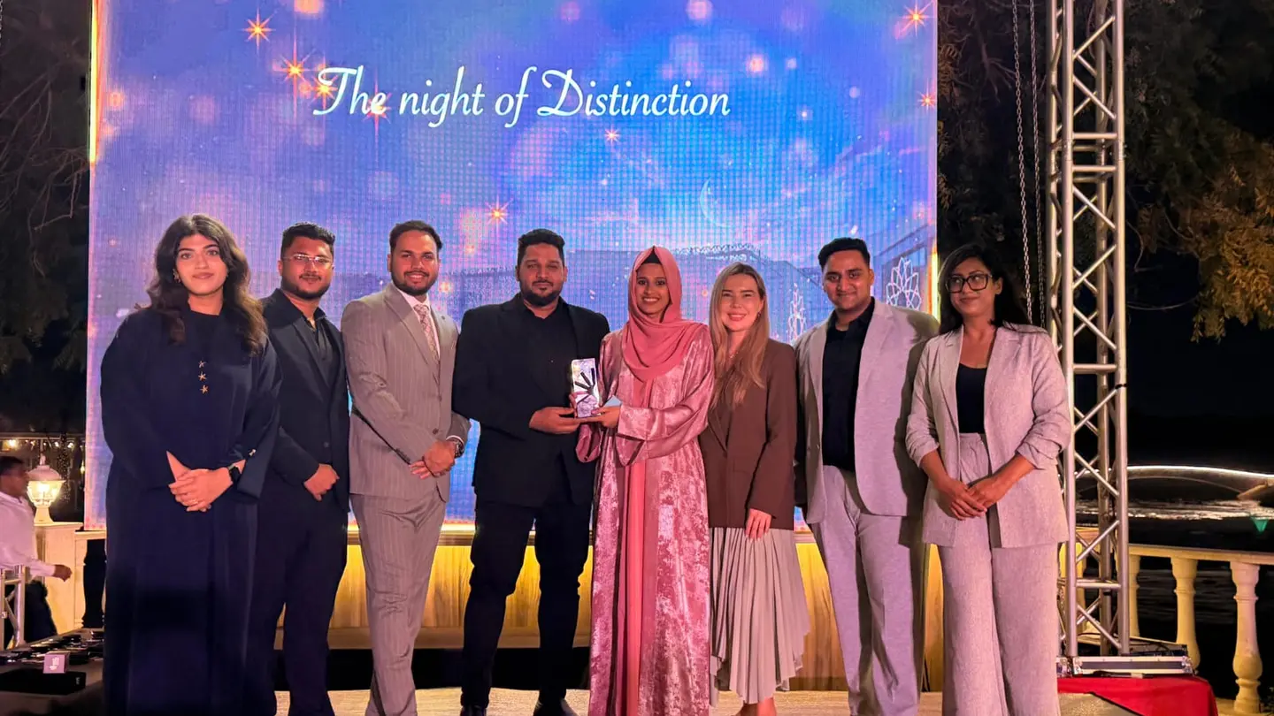 Kinzaad team together on stage with a SHAMS Free Zone award